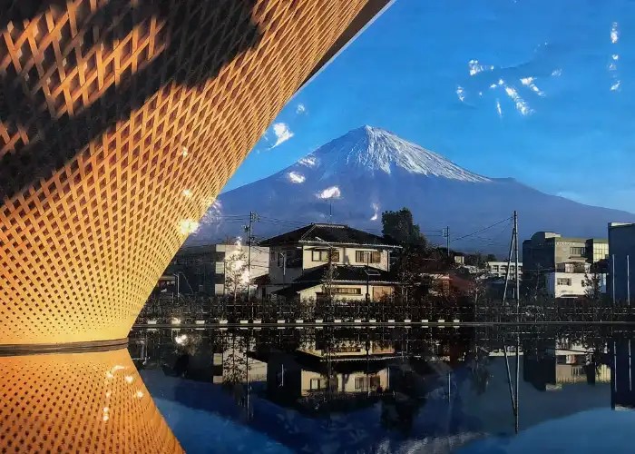 Looking at Mt. Fuji from the Mt. Fuji Cultural Center, reflected against the water.